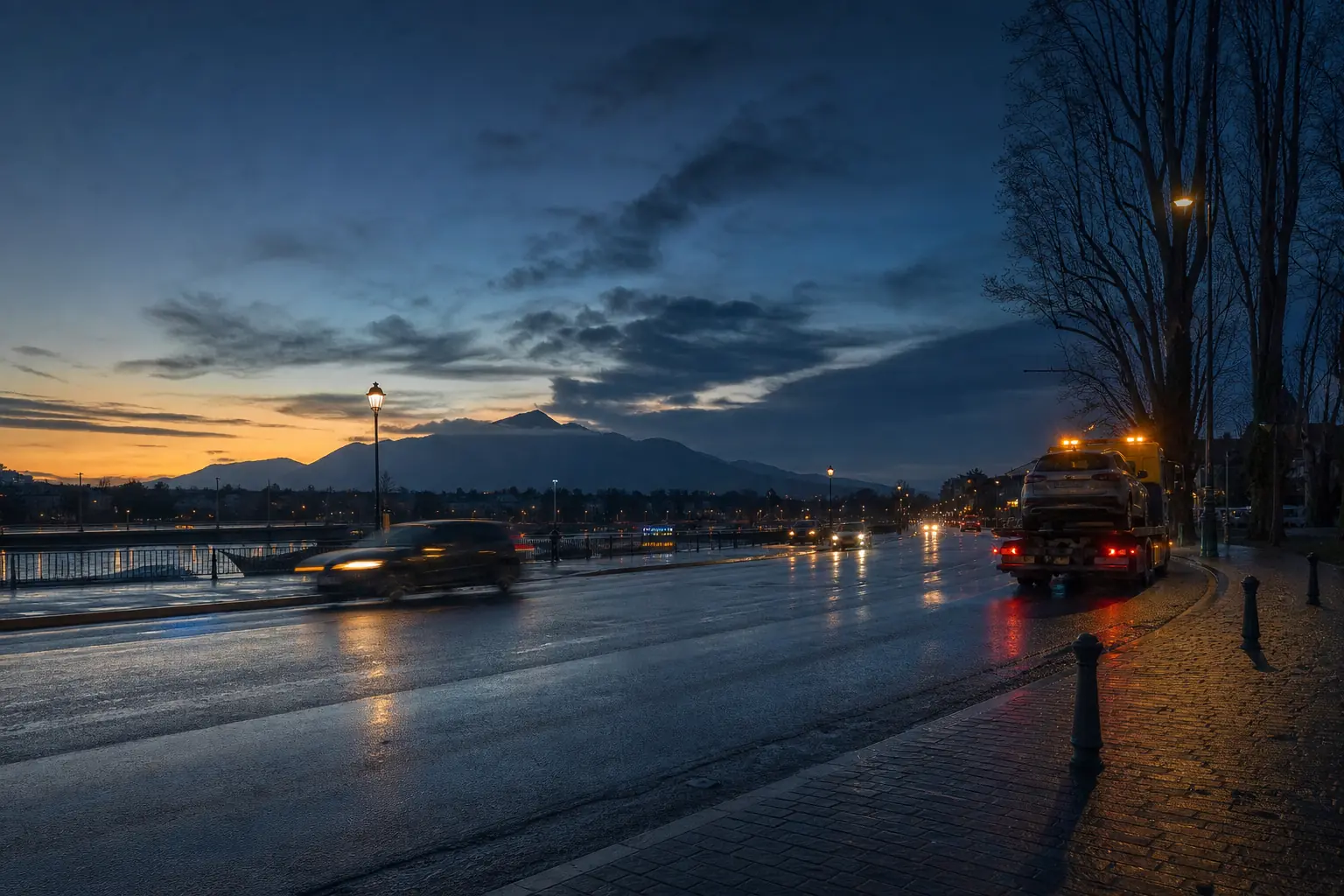 Dépanneuse sur un boulevard frontalier Annemasse–Genève à l’heure bleue
